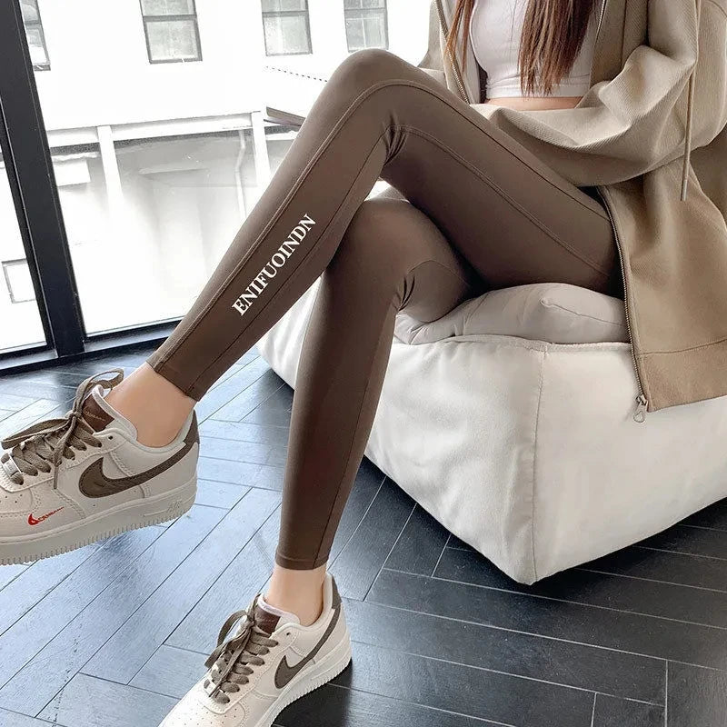 Leggings sportivi donna a vita alta – Pantaloni aderenti alla caviglia, modello slim per yoga e palestra. Design fashion con cucitura a matita, comodi ed eleganti per ogni occasione casual.